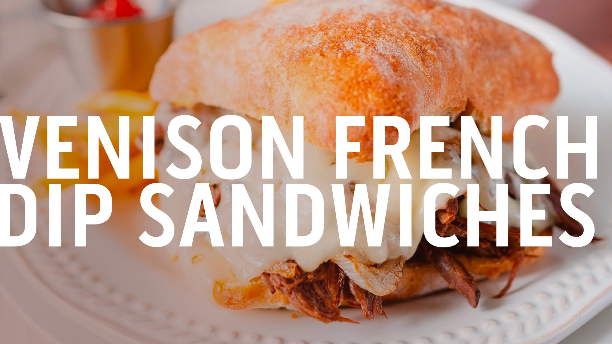 A recipe banner for "Crock-Pot Venison French Dip Sandwiches