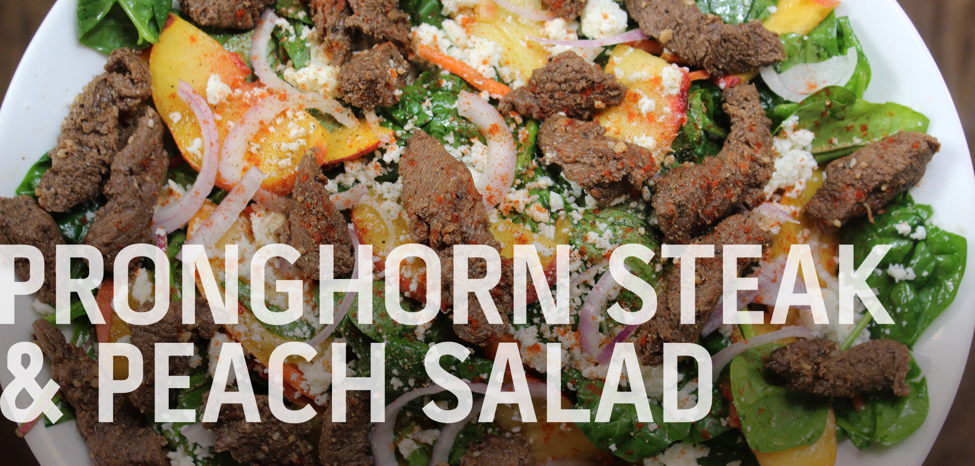 A recipe banner for "Pronghorn Steak & Peach Salad" showing the finished salad on a plate