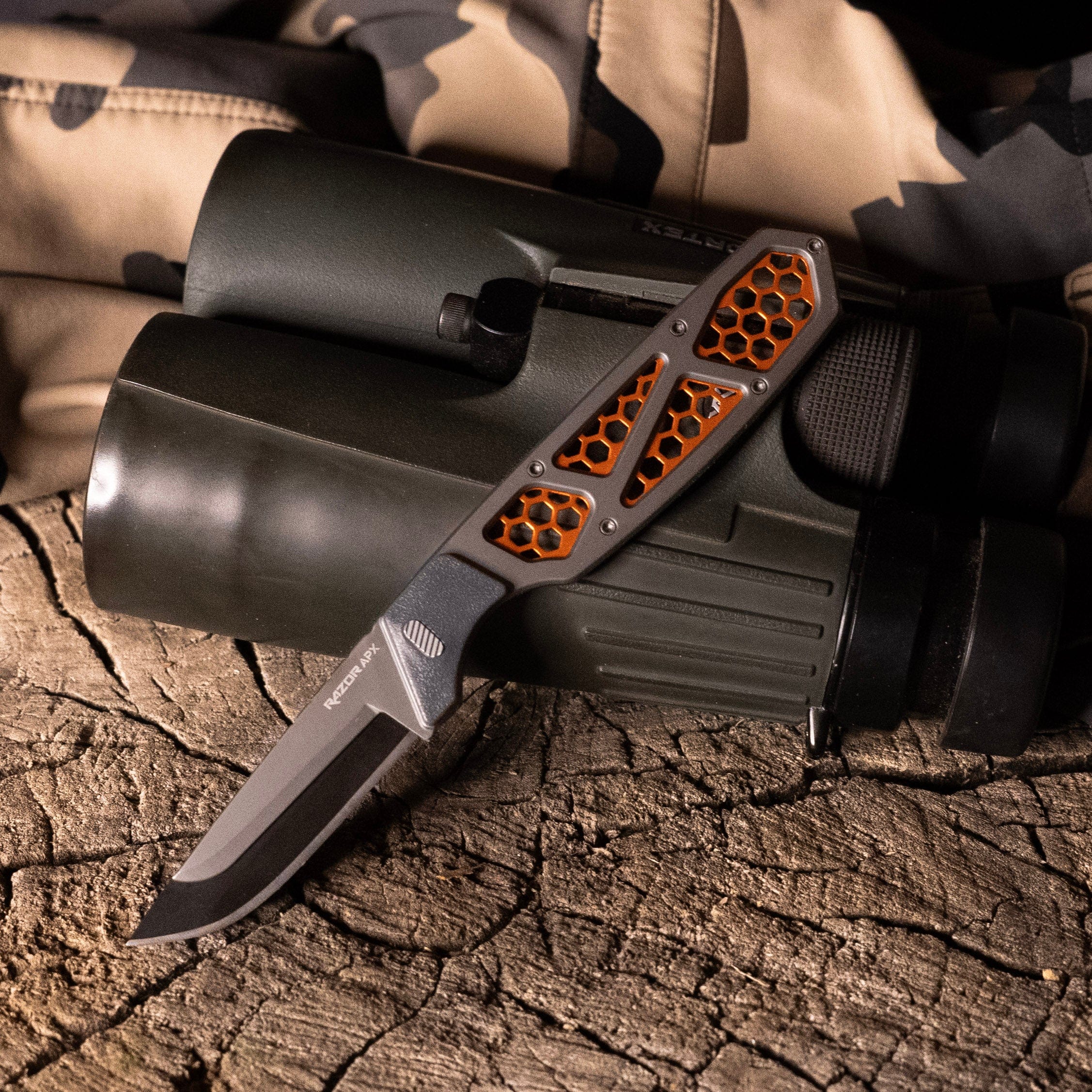 A close-up of the Razor-APX's textured handle and blade