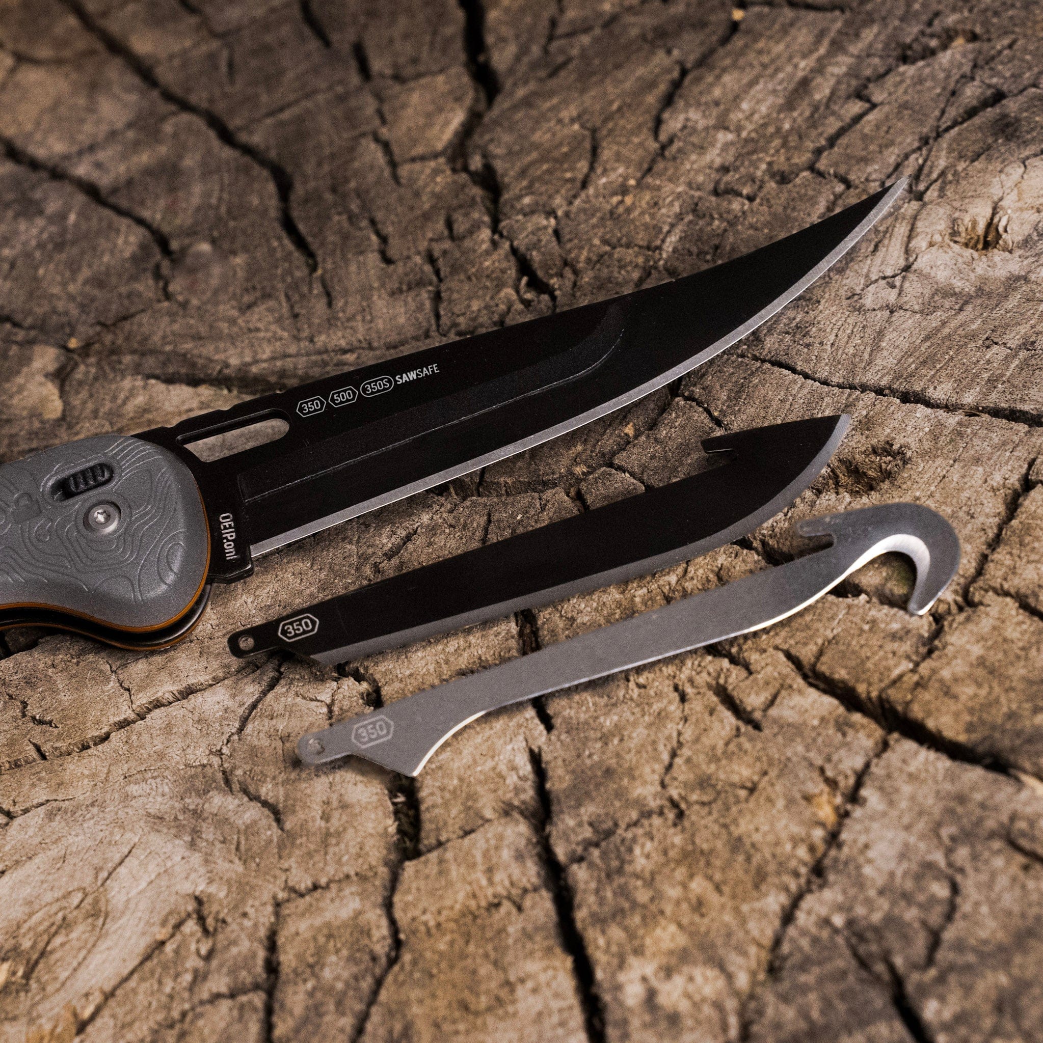 The 5.0-inch Razor-HTX folding knife shown in use, filleting a fish