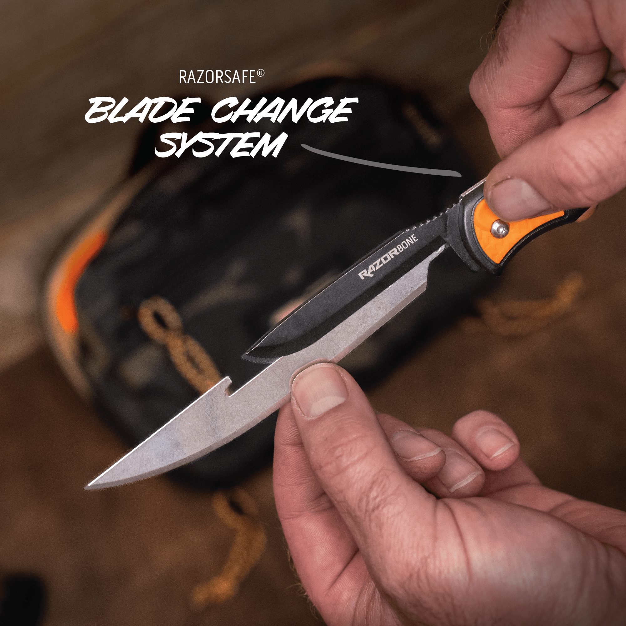 Person changing a blade on a Razorsafe knife with a blurred background