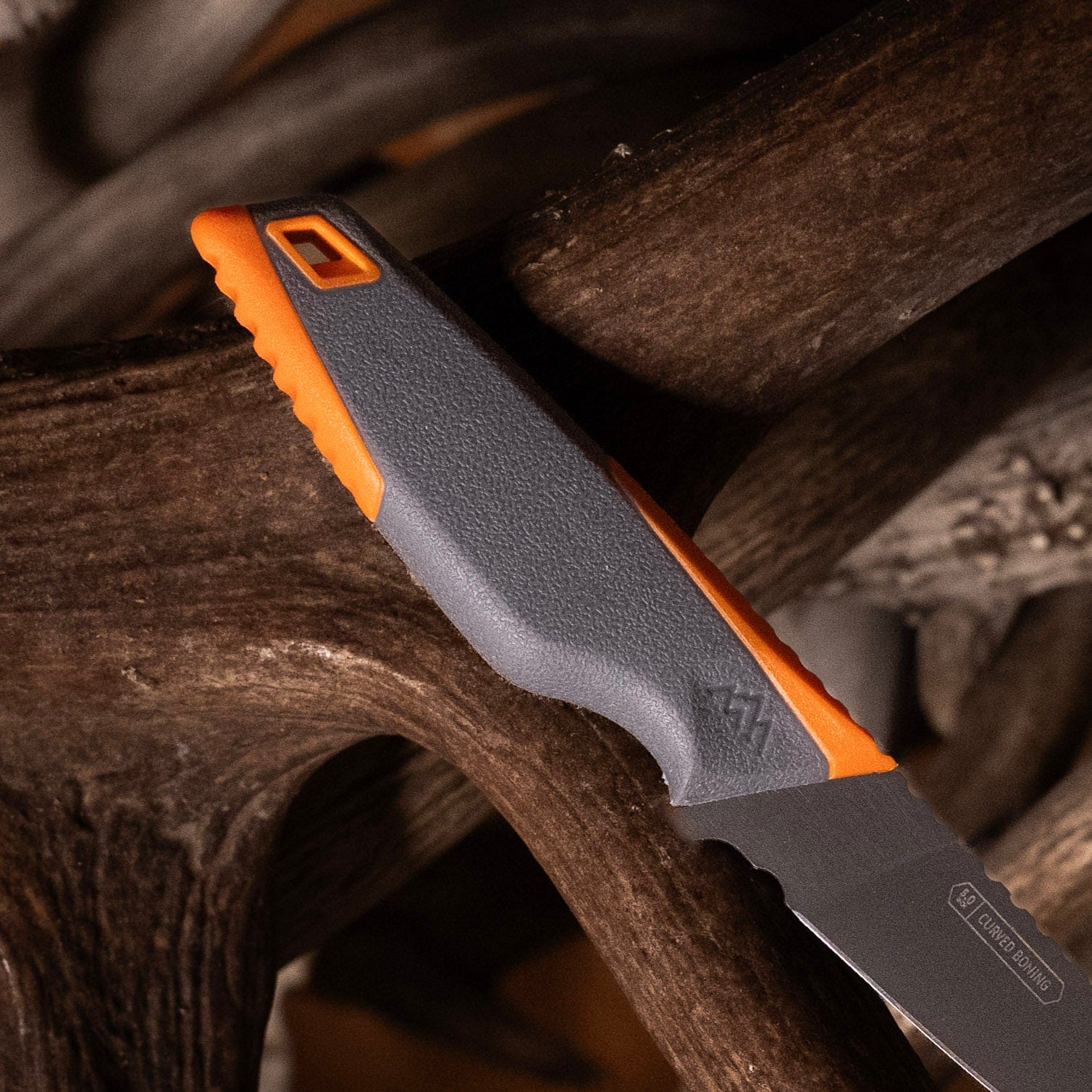 The Vantex boning knife shown with its protective sheath