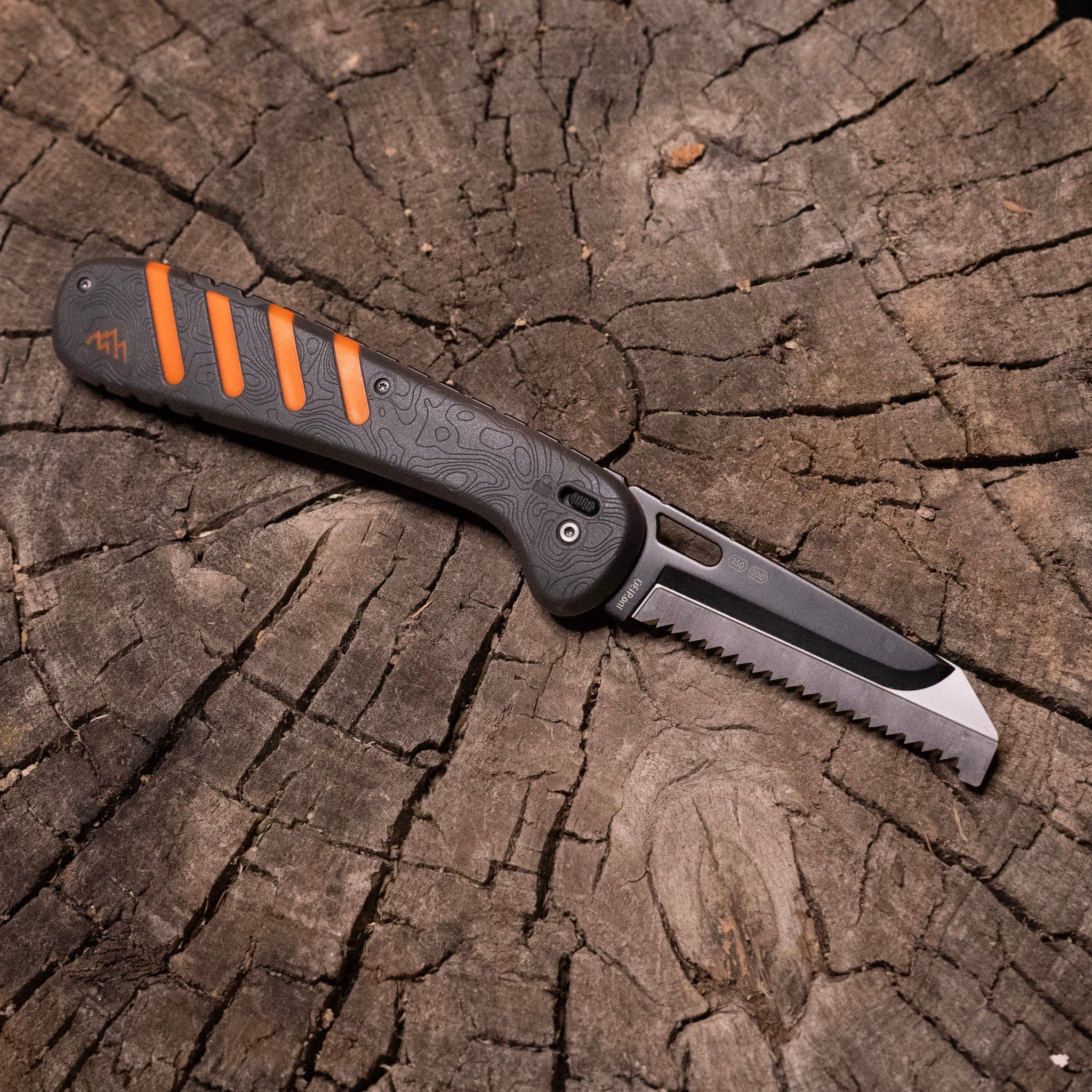 The 5.0-inch Razor-HTX folding knife with an orange and black handle, designed for boning and filleting