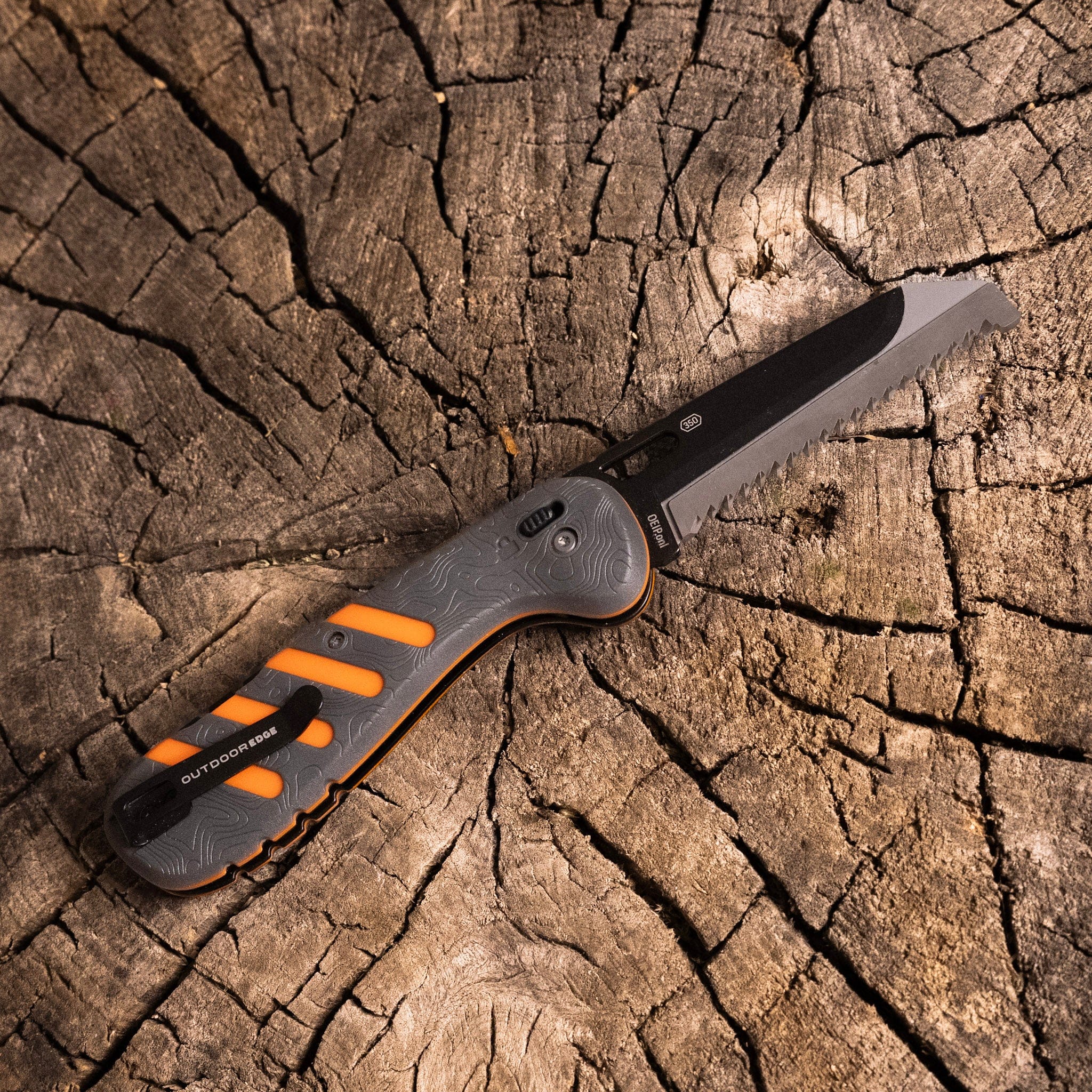 The 3.5-inch Razor-HTX folding knife with an orange and black handle