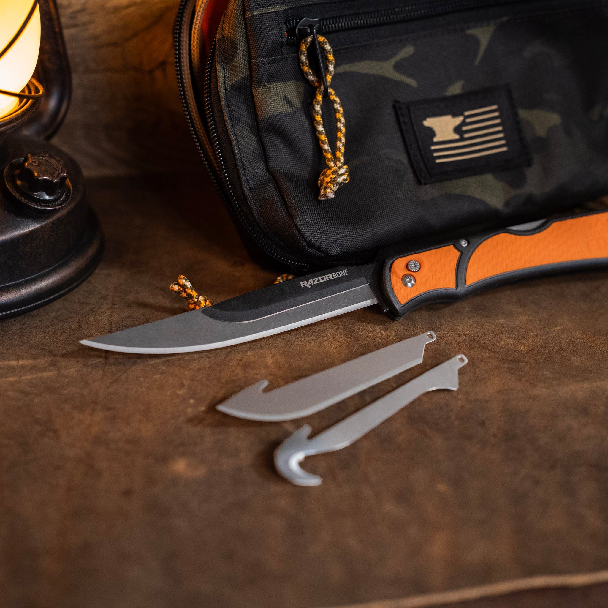 Knife with sheath and accessories on a textured surface