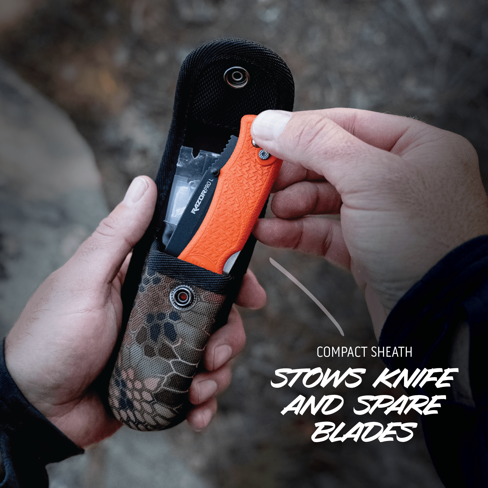Compact sheath with knife and spare blades held by hands against a blurred natural background