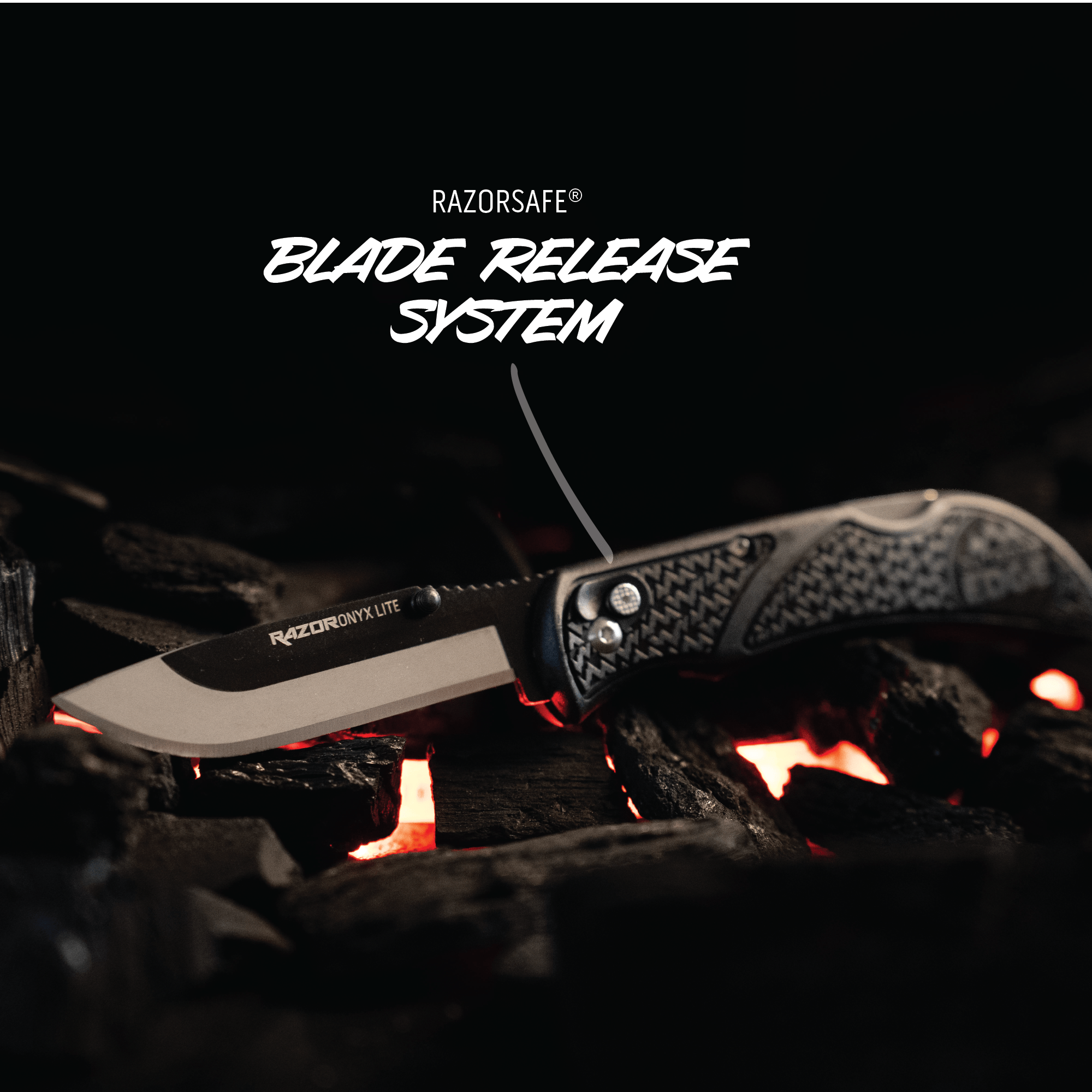 Knife with 'Razorsafe' blade release system on a dark background
