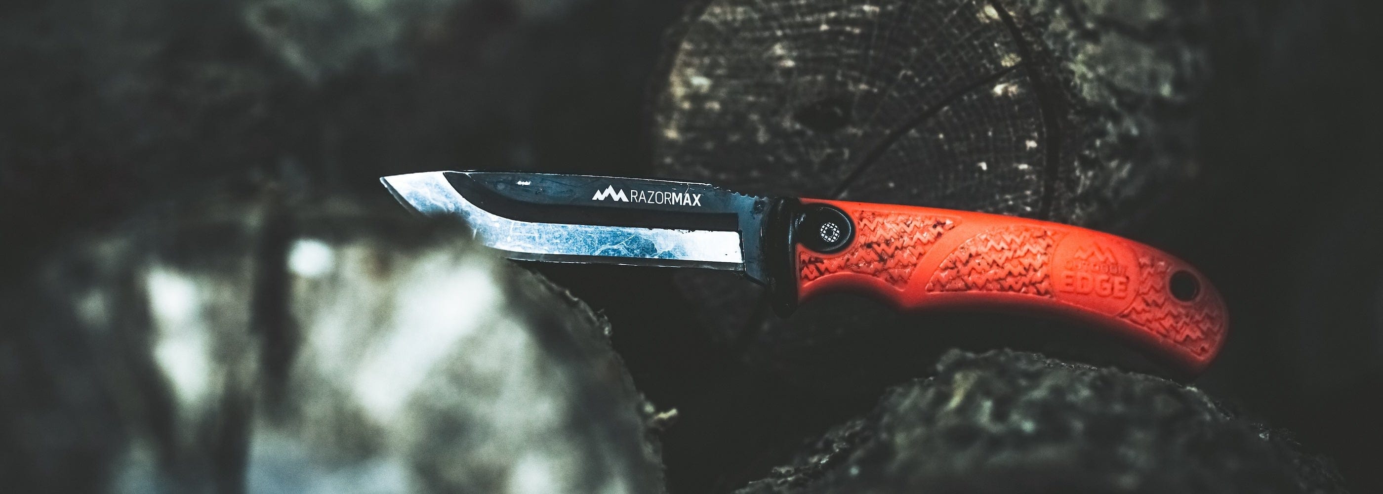 A close-up of the RazorMax blade holder and the easy-to-use blade release button