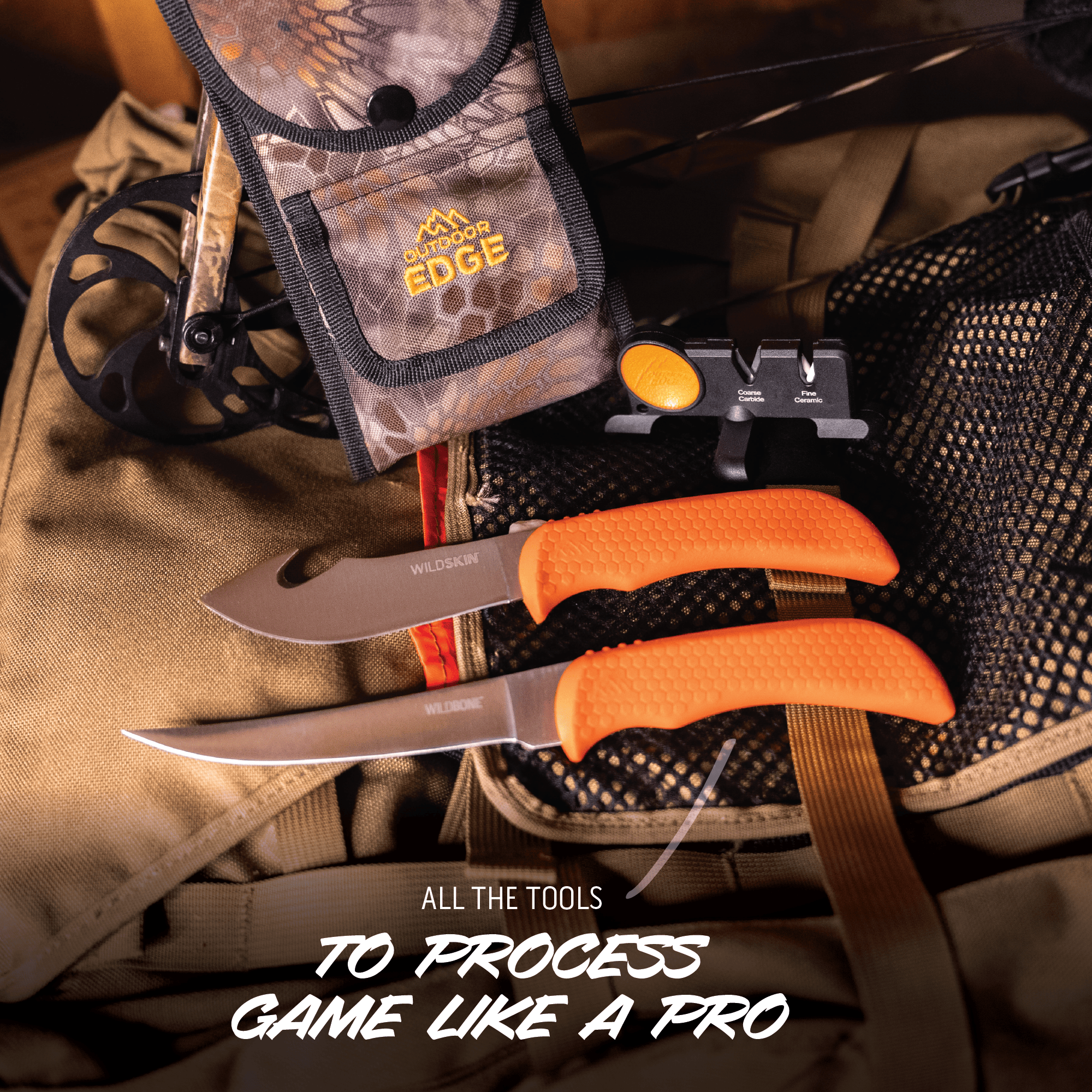 Two orange-handled knives on a camouflage-patterned background with 'Outdoor Edge' branding.