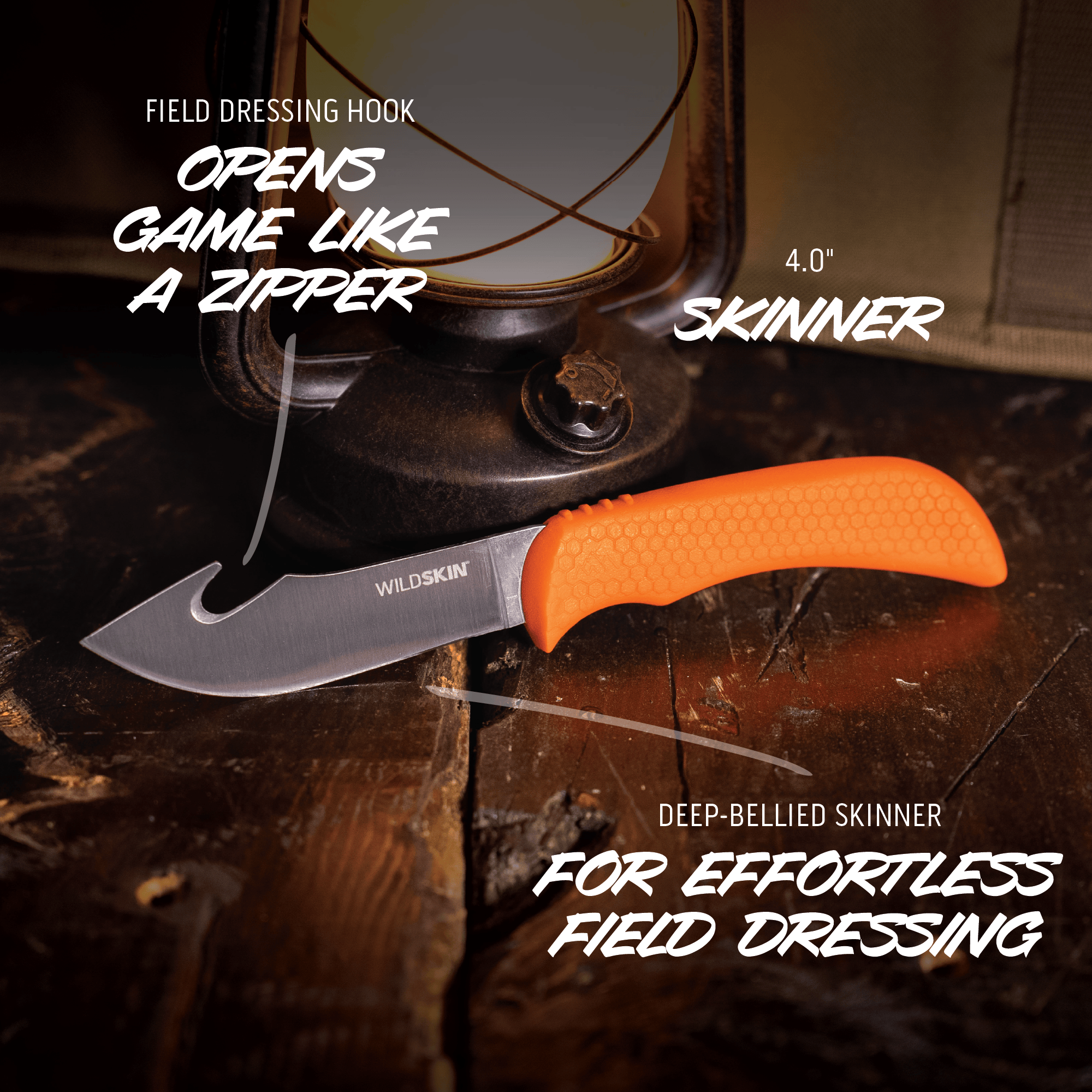 Knife with orange handle on a wooden surface, surrounded by hunting tools.