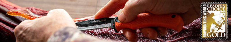 A close-up of the framed 2021 Bowhunting World Reader's Choice Gold Award presented to Outdoor Edge for the knife category