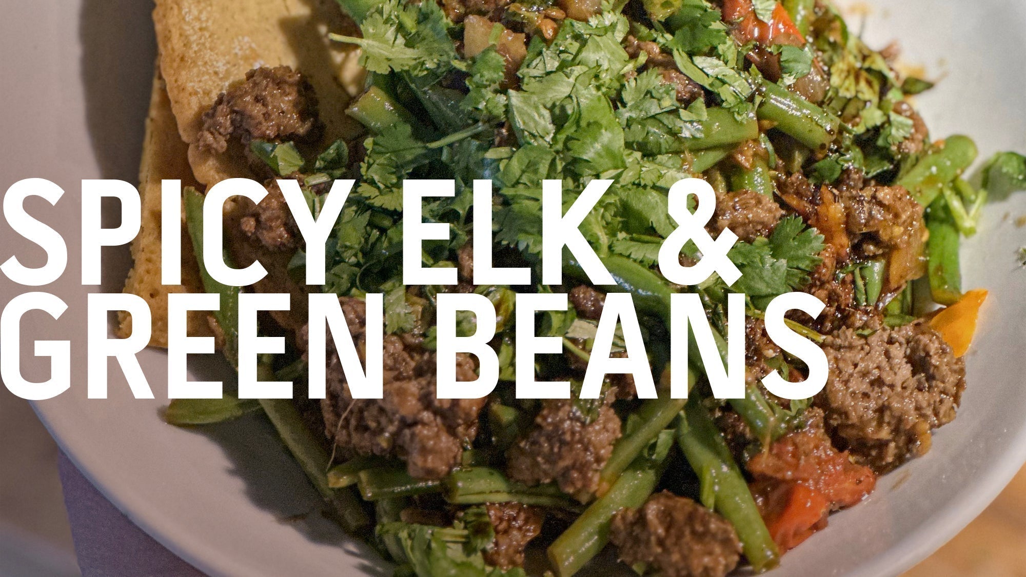 A dish of spicy elk and green beans, a flavorful stir-fry.