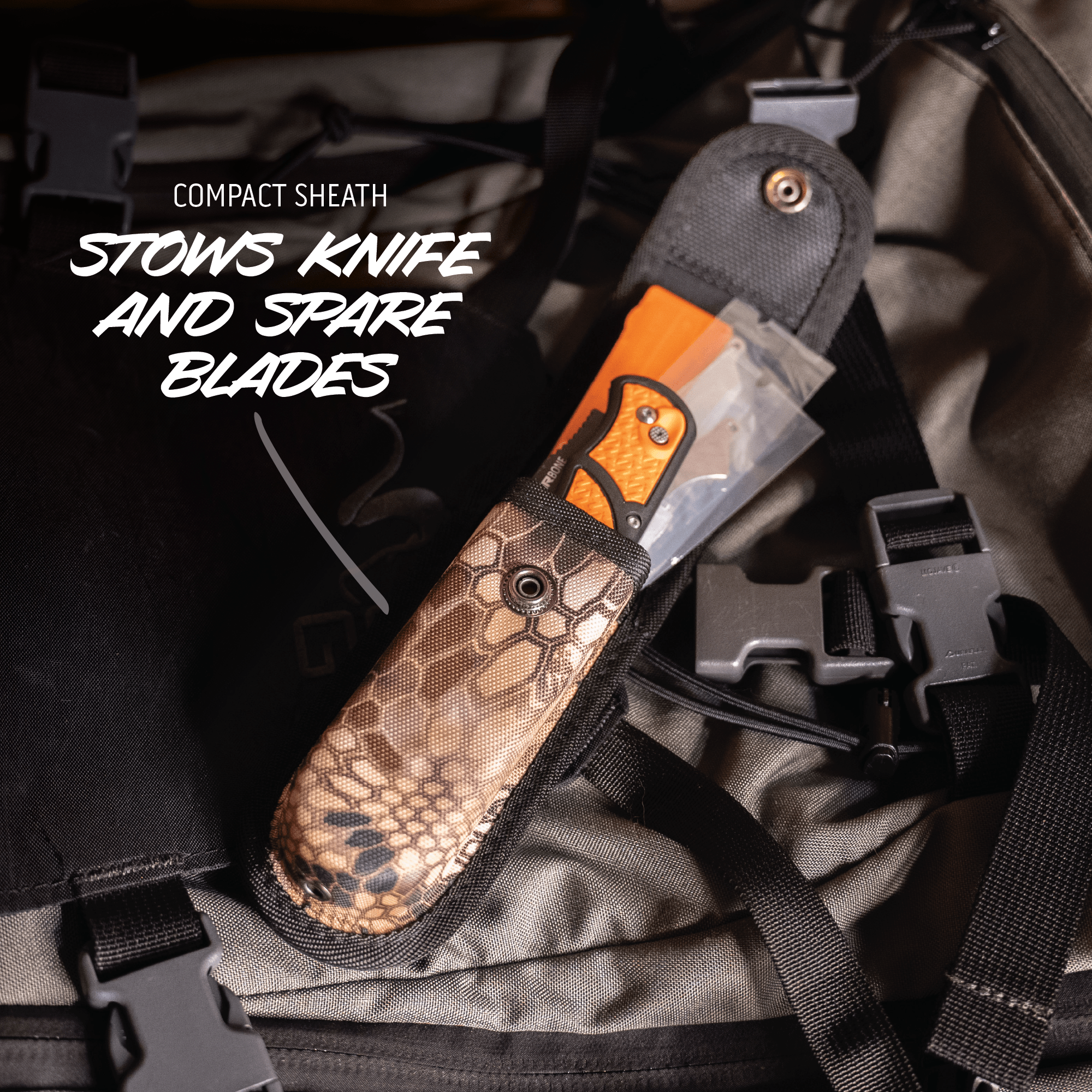 Compact sheath stowing a knife and spare blades on a tactical background