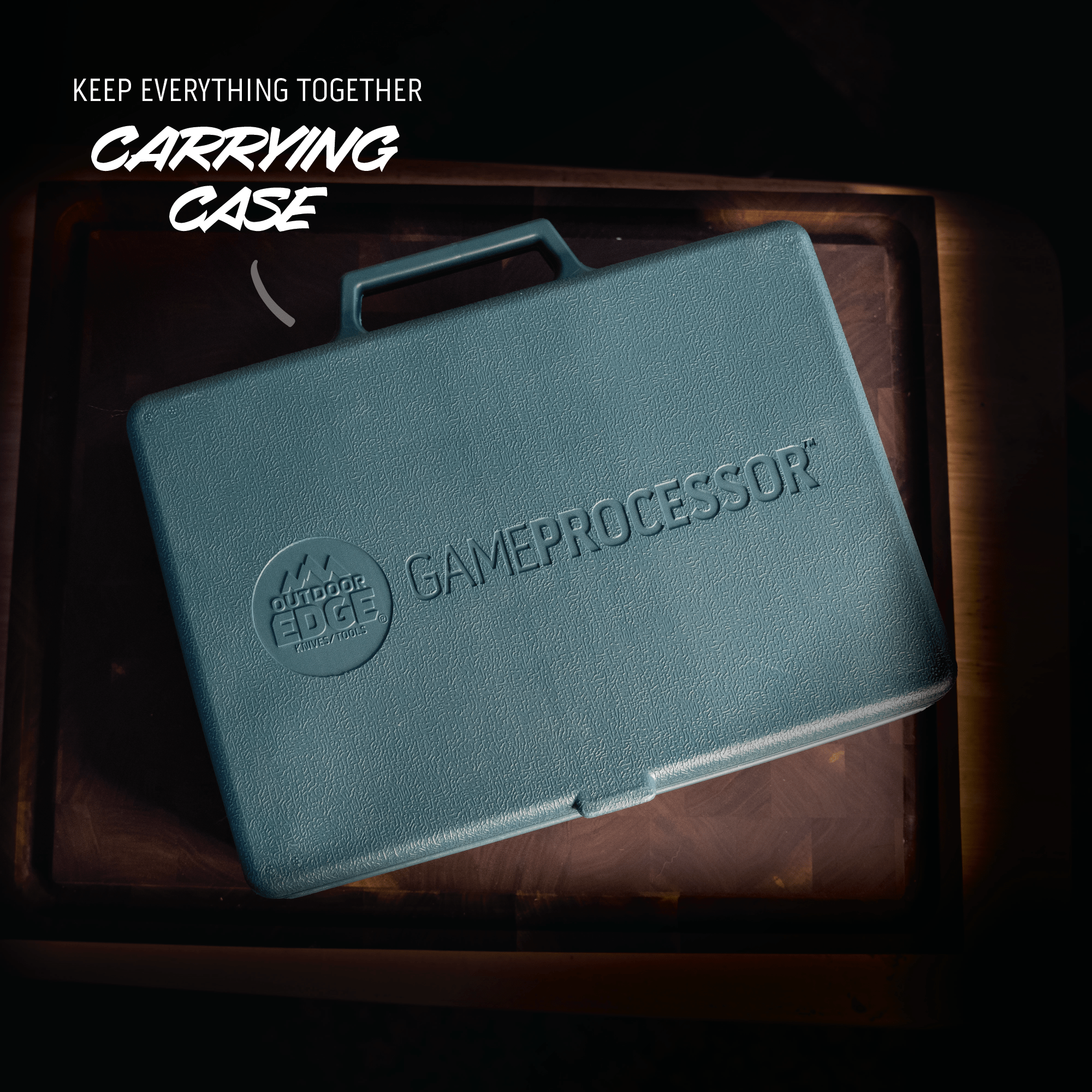 Green carrying case with 'Gameprocessor' branding on a wooden surface