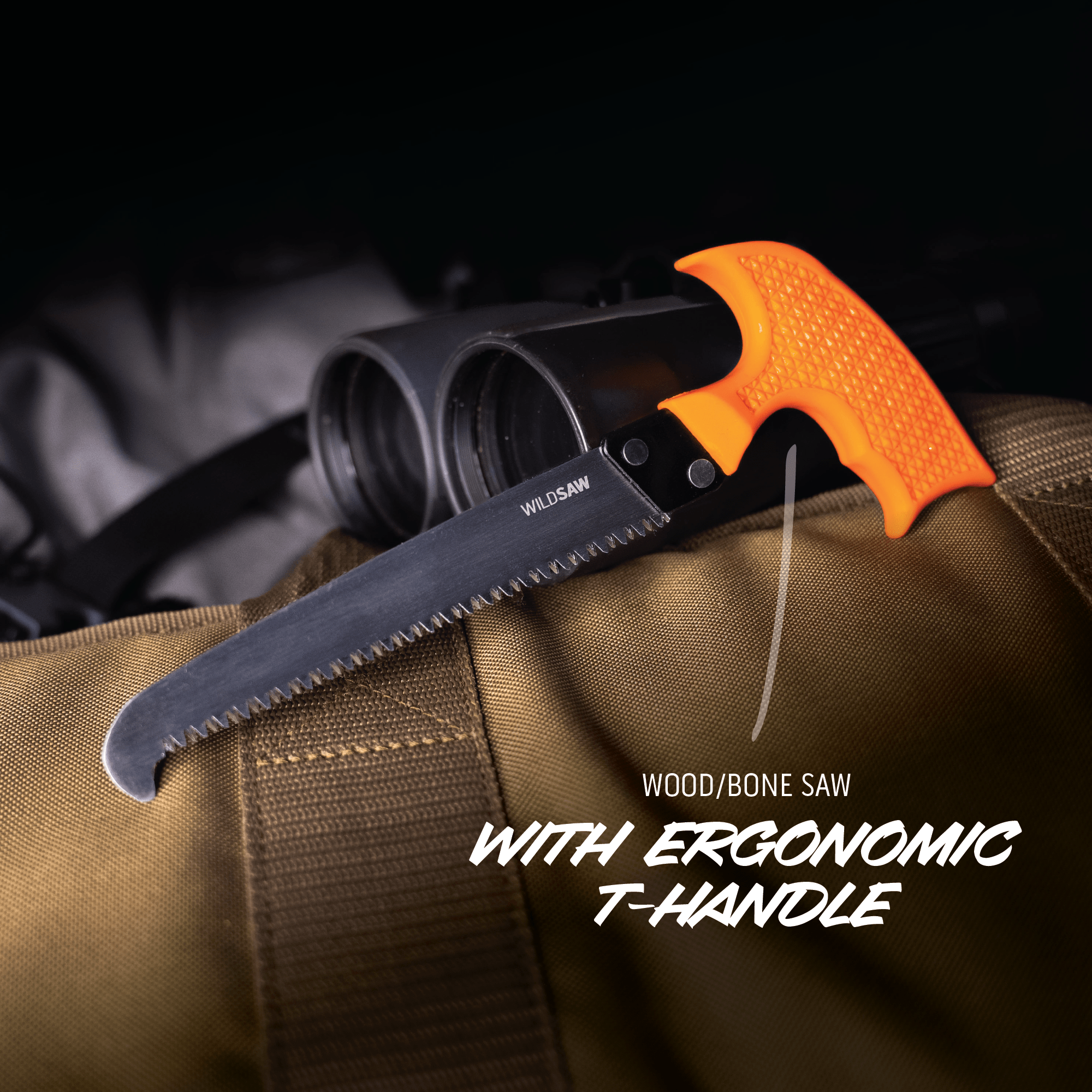 Wood/bone saw with ergonomic T-handle on a brown surface