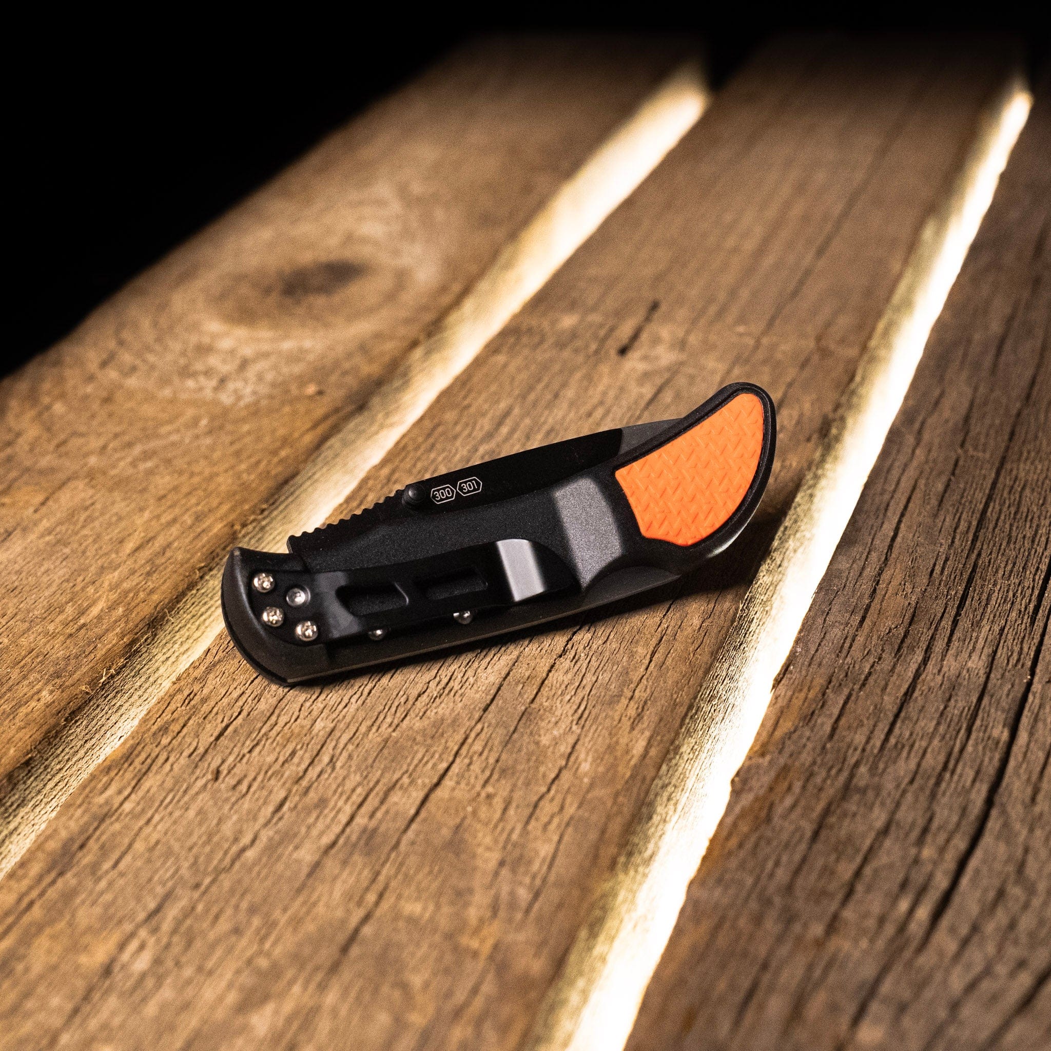 Backside of a closed pocket knife showing the pocket clip