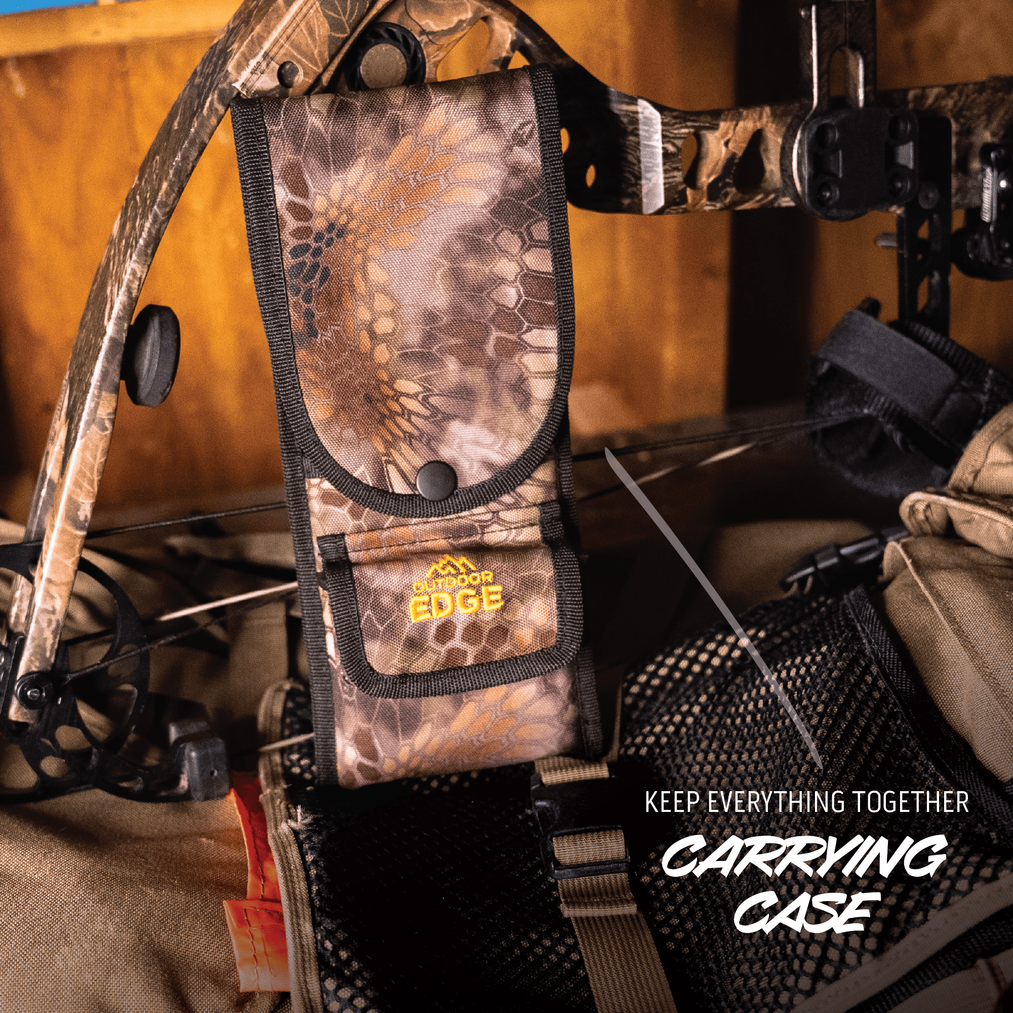 Camo carrying case for archery equipment with 'Outdoor Edge' branding on a wooden background.