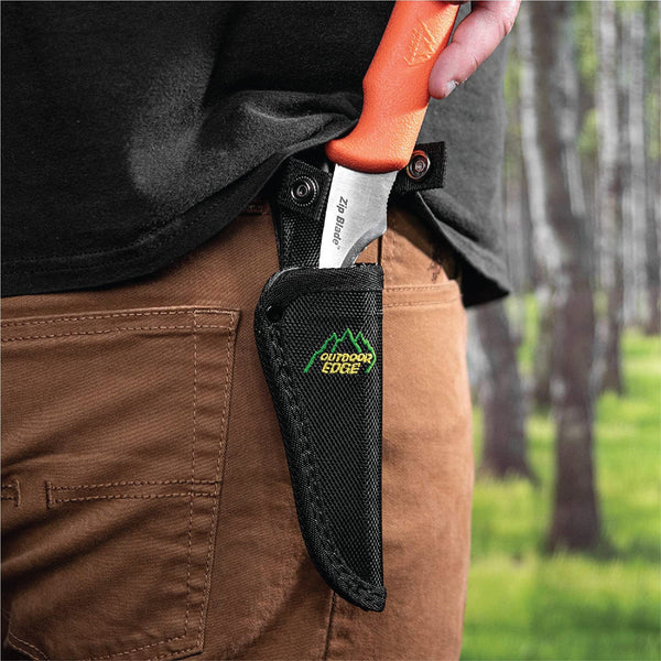 Outdoor Edge ZipBlade Hunting Knife showing entering sheath in the field.